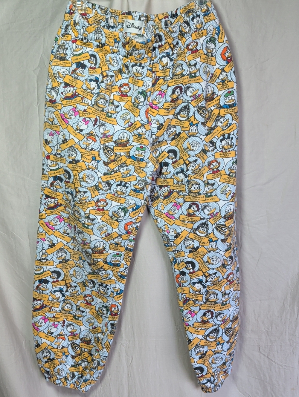 Disney White Jogger Pants with Yellow Character Print